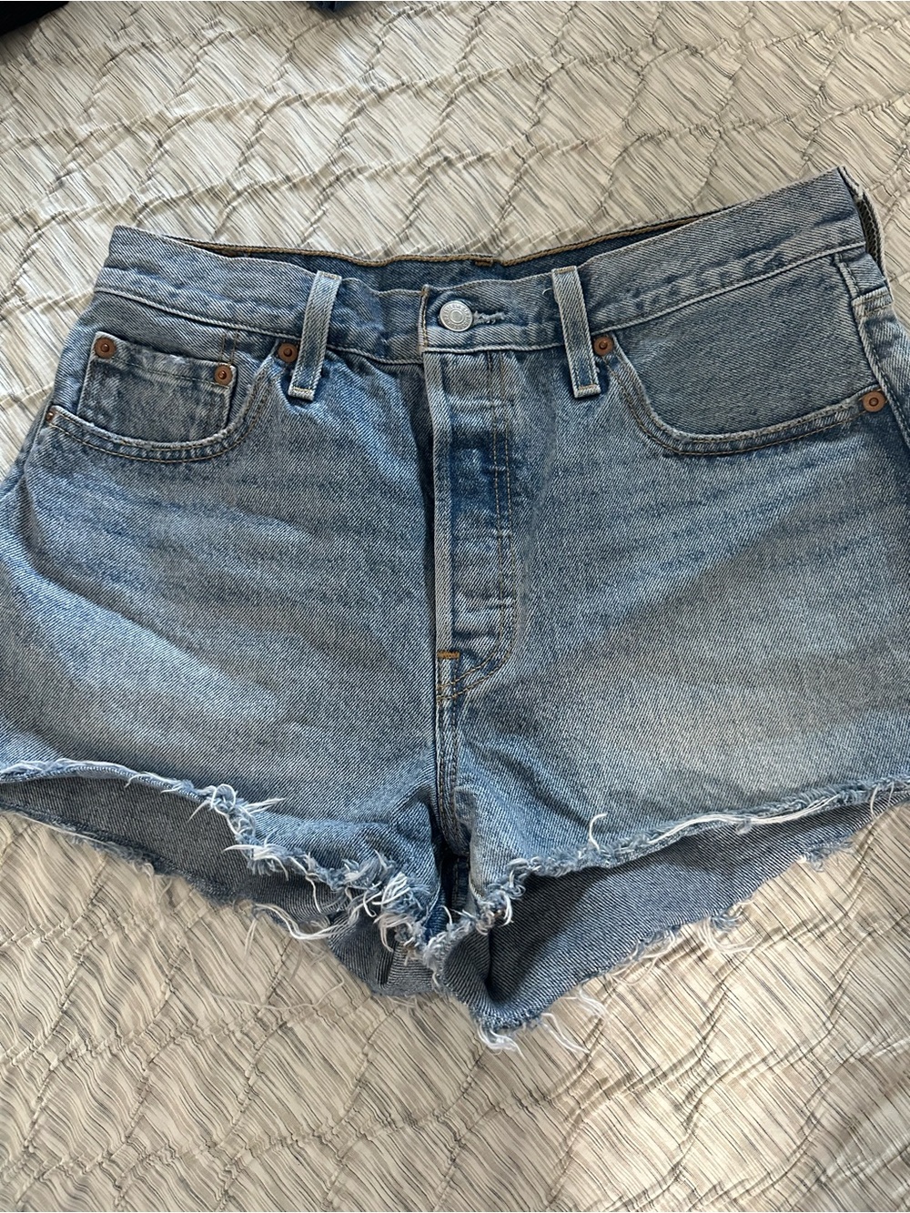 Levi's Light Wash High-Rise Frayed Hem Denim Shorts